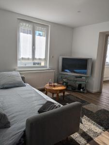 Et tv og/eller underholdning på Appart Épine Strasbourg + 18 billeder