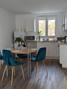 Køkken eller tekøkken på Appart Épine Strasbourg