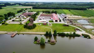 an aerial view of an island in a lake at Hotel Sebory in Przasnysz