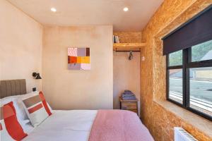 Ένα ή περισσότερα κρεβάτια σε δωμάτιο στο Finest Retreats - The Apartment
