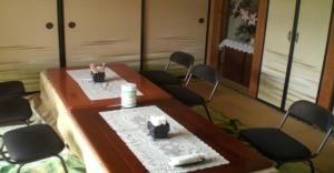 a conference room with a table and chairs at Kakinoen / Vacation STAY 3939 in Nakagawa