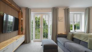 Μια τηλεόραση ή/και κέντρο ψυχαγωγίας στο Spacious & Practical 2-Bedroom Sheffield Flat by PureStay +26 φωτογραφίες