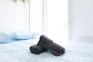 Postel nebo postele na pokoji v ubytování T2 balcon avec parking sécurisé et gratuit