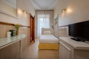 Телевизор и/или развлекательный центр в Hotel Palladium Palace