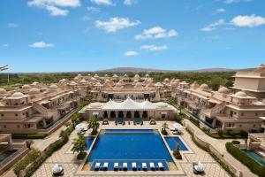 an aerial view of a resort with a swimming pool at ITC Grand Bharat, a Luxury Collection Retreat, Gurgaon, New Delhi Capital Region in Gurgaon