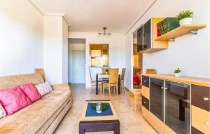 a living room and kitchen with a couch and a table at 11 Nights Minimum in Cabanes