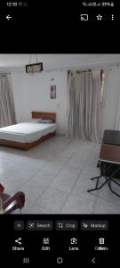a view of a room with a bed and a table at Female privat rooms cairo center in Cairo