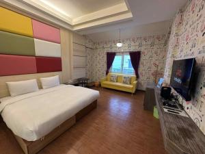 Et tv og/eller underholdning på 晶想汽車旅館