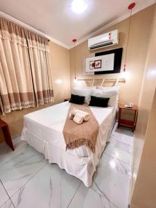 Ένα ή περισσότερα κρεβάτια σε δωμάτιο στο Viva Jeri Jericoacoara