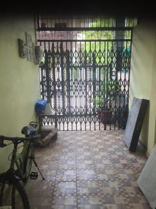 a bike parked in front of a gate at d3 avanti vihar in Raipur