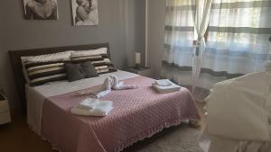 Katil atau katil-katil dalam bilik di Sicily Wonders, 2 minute walk to the beach