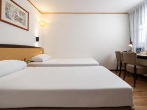 Postel nebo postele na pokoji v ubytování Campanile Hotel & Restaurant Gent