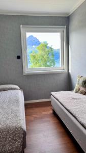 Postel nebo postele na pokoji v ubytování Artic Dream + 17 fotografií