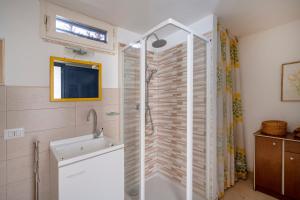 Koupelna v ubytování Il Vecchio Leccio + 29 fotografií