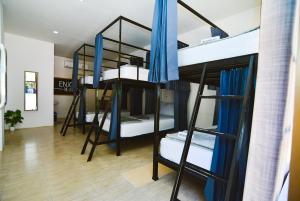 a group of bunk beds in a room at Lingling Hostel in Haad Rin +13 photos