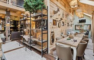 a dining room with a table and chairs at Hunting Lodge in Detern