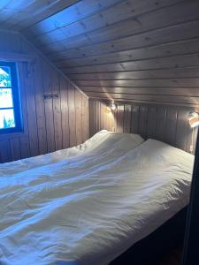 Postel nebo postele na pokoji v ubytování Gaustablikk Gaustatoppen + 24 fotografií
