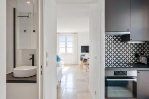 Kuchyň nebo kuchyňský kout v ubytování Appartement Portolan - Welkeys