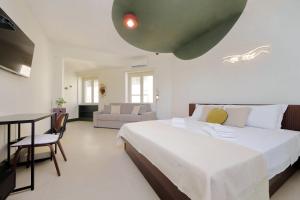 En eller flere senge i et værelse på Big Mama s Stays