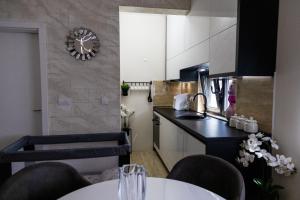 Kuchyň nebo kuchyňský kout v ubytování Apartman Sunce Lux N