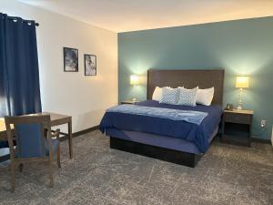 Ένα ή περισσότερα κρεβάτια σε δωμάτιο στο The Northeastland Hotel