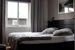 Hotell Tjamstan Malå客房内的一张或多张床位