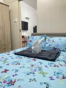 Postel nebo postele na pokoji v ubytování Vonz Staycation Near Moa