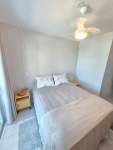 Ένα ή περισσότερα κρεβάτια σε δωμάτιο στο Apto praia brava Itajaí