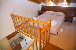 Postel nebo postele na pokoji v ubytování Summertime Inn