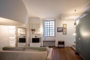 Televisyen dan/atau pusat hiburan di Loft Moderno a 500m da Loreto M1 M2