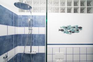 Koupelna v ubytování Casa Azzurra - Deluxe apartment in city center