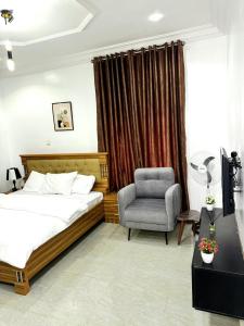 Ένα ή περισσότερα κρεβάτια σε δωμάτιο στο DUWIJAY BnB