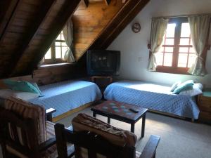 Μια τηλεόραση ή/και κέντρο ψυχαγωγίας στο Pinamar House NORTH