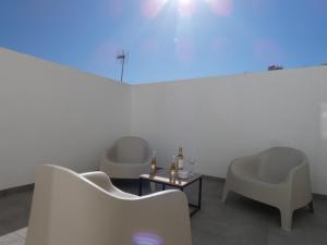 Posezení v ubytování EDIFICIO La Botica de Enrique by Málaga Planners