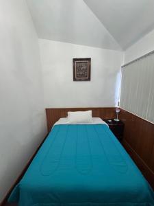 Katil atau katil-katil dalam bilik di Hotel CALLI YOLOTL Teotihuacan