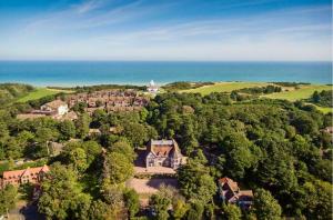 an aerial view of a house in the trees at Cromer Getaway luxury apartment in Cromer +16 photos
