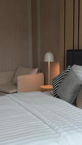 Winn's Hotel Bentong客房内的一张或多张床位
