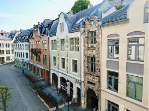 an aerial view of buildings in a city at Ålesund Central Apartment in Ålesund
