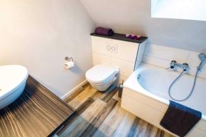 Ένα μπάνιο στο Ferienwohnung Relax +10 φωτογραφίες