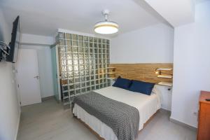 Ένα ή περισσότερα κρεβάτια σε δωμάτιο στο Casa Iglesia