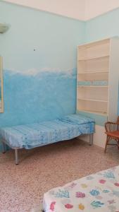 Postel nebo postele na pokoji v ubytování Appartamentino 2-4 posti letto