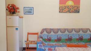 Postel nebo postele na pokoji v ubytování Appartamentino 2-4 posti letto + 4 fotografie