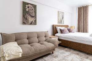 Postel nebo postele na pokoji v ubytování Colours Studios