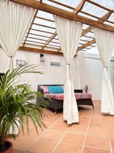 Postel nebo postele na pokoji v ubytování Sky House Cartagena