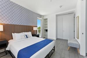 Ένα ή περισσότερα κρεβάτια σε δωμάτιο στο MILLA South Beach