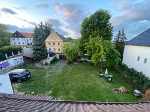 an aerial view of a yard with a house at Underhillhouse in Liběšice