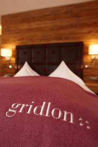 Posteľ alebo postele v izbe v ubytovaní Hotel Gridlon