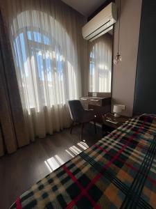 Katil atau katil-katil dalam bilik di Apsilankimas jaukiojia vietoje