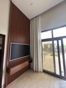 TV a/nebo společenská místnost v ubytování WeTake Hawana + 17 fotografií