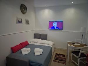 Un pat sau paturi într-o cameră la Mia's Home